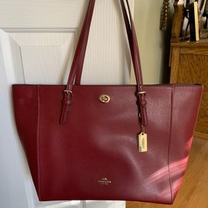 Never been used Coach purse